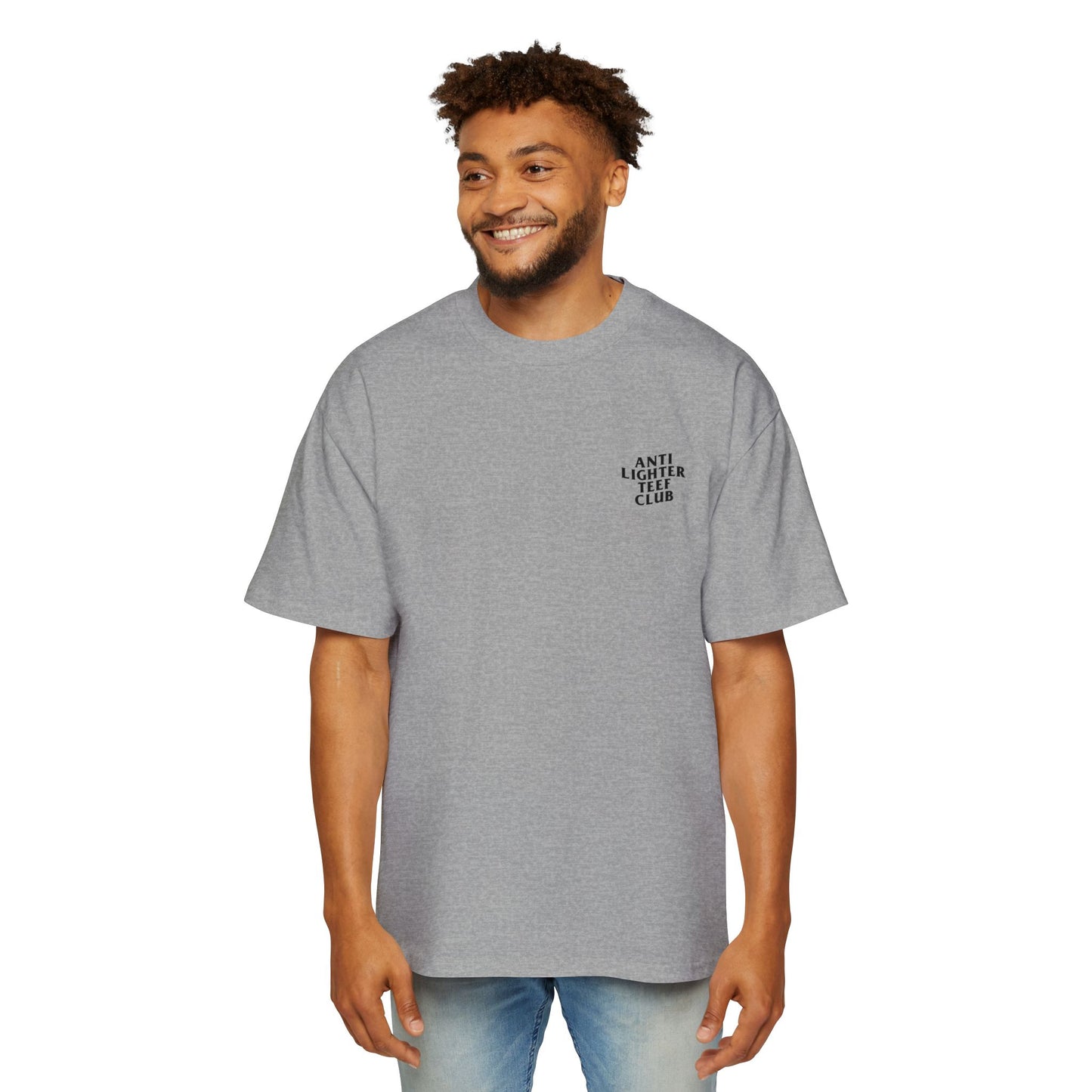 White oversized t-shirt featuring bold black text on the back reading "Anti Lighter Teef Club," with a relaxed fit and 100% cotton fabric for comfort and style.